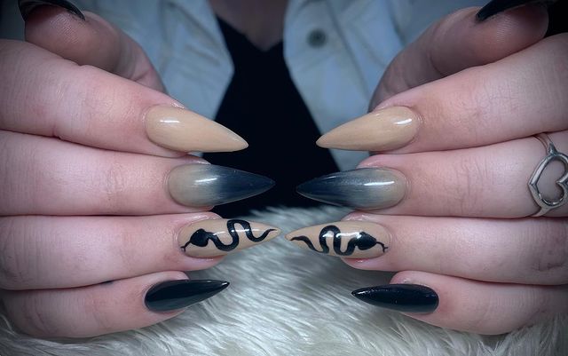 Long nails with snake design