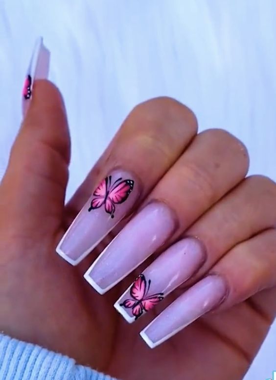 purple butterfly acrylic nails.