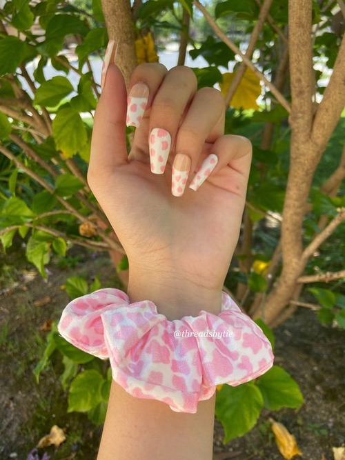 pink and white cow print nails - strawberry cow print nails