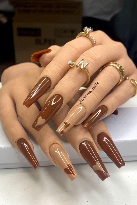 stunning almond brown nails