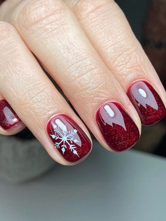 red nails with snowflakes