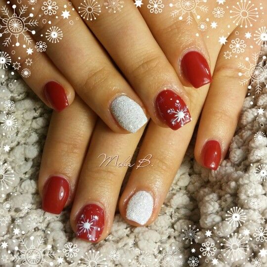 red nails with white snowflakes