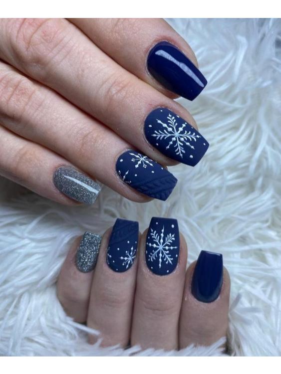 snowflake nail design on dream blue