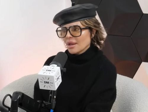 Lisa Rinna wearing a beret and sunglasses during a podcast interview