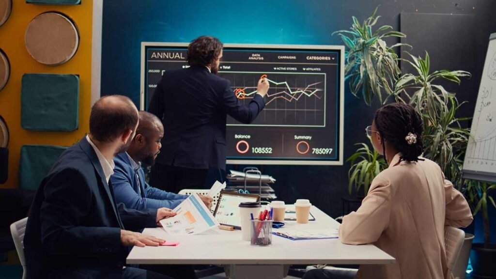 Team reviewing trade show marketing analytics for ROI optimization