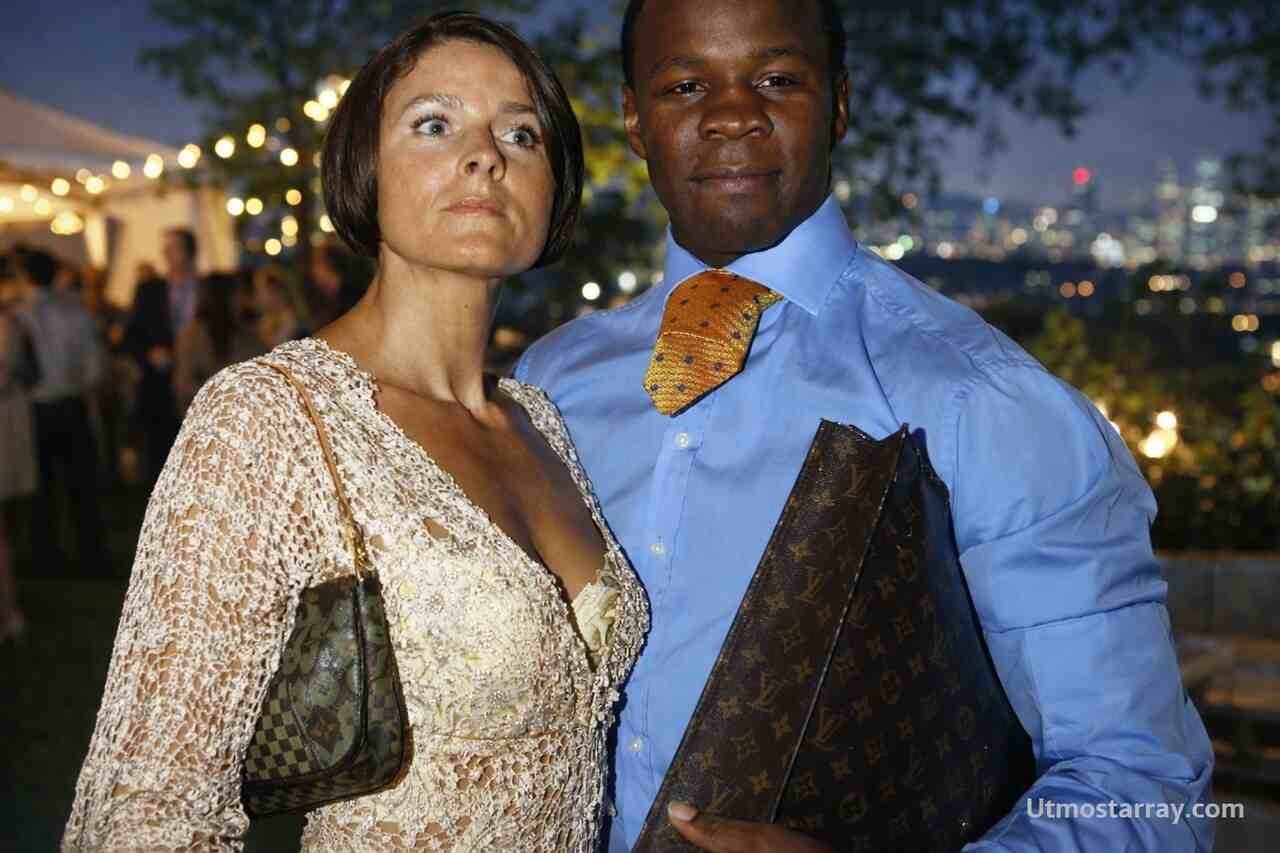 Chris Eubank and his wife at an elegant event